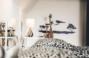 Ένα ή περισσότερα κρεβάτια σε δωμάτιο στο Vakantiewoning Hakuna Matata +107 φωτογραφίες