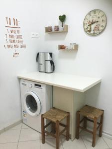 Kuchyňa alebo kuchynka v ubytovaní cozy apartment in Nafplio old town