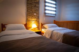 Cama o camas de una habitación en Vila Magnolija