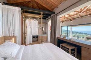 Cama ou camas em um quarto em Artblue Villas
