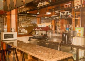 a kitchen with a counter and a counter top at La Sota in Castro-Urdiales
