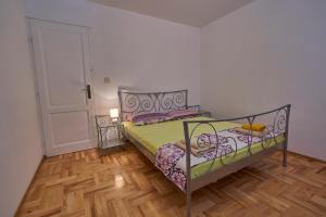 Postel nebo postele na pokoji v ubytování Apartments Milina