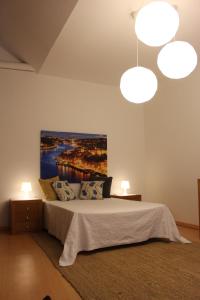 Ein Bett oder Betten in einem Zimmer der Unterkunft Oportobestview-River