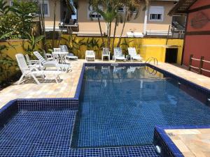 A piscina localizada em Pousada Vila do Sol Juquehy ou nos arredores