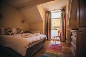 Cama o camas de una habitación en Tynycornel Hotel