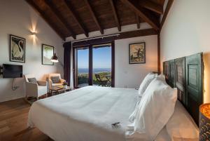 Postel nebo postele na pokoji v ubytování Hotel Rural 3 Cabos