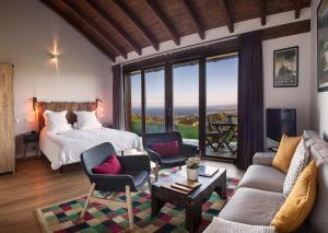 Postel nebo postele na pokoji v ubytování Hotel Rural 3 Cabos