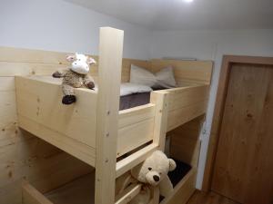 A bed or beds in a room at Mottnerhof