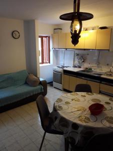 Η κουζίνα ή μικρή κουζίνα στο Apartman Romandic