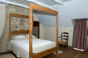 Postel nebo postele na pokoji v ubytování LES HAUTS DU CAUSSE + 3 fotografie