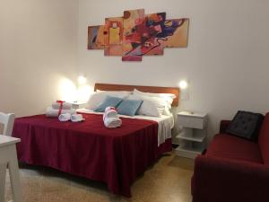 A bed or beds in a room at YooRoom