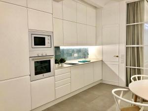 Kuchyň nebo kuchyňský kout v ubytování Apartamento Frederick “Centrico y con Clase”