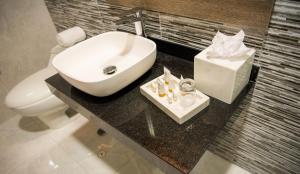 Um banheiro em Hotel Diamond Lima