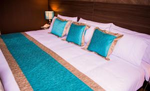 Cama ou camas em um quarto em Hotel Diamond Lima