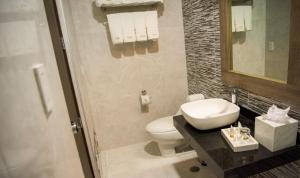 Um banheiro em Hotel Diamond Lima