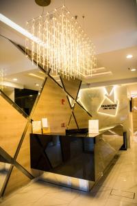 Uma área de estar em Hotel Diamond Lima