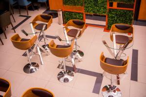 Um restaurante ou outro lugar para comer em Hotel Diamond Lima