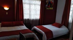 Letto o letti in una camera di Hotel Andino