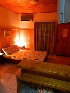 Postel nebo postele na pokoji v ubytování Corfu Dream Village
