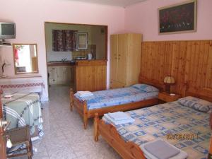 Postel nebo postele na pokoji v ubytování Corfu Dream Village