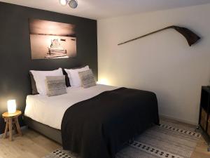 Postel nebo postele na pokoji v ubytování B&B Bleiswijk