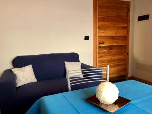 A bed or beds in a room at B&B Villa Dalegno