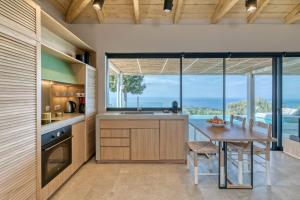 A cozinha ou cozinha compacta de Artblue Villas