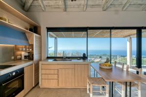 A cozinha ou cozinha compacta de Artblue Villas
