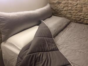 A bed or beds in a room at Dimora Le Zagare