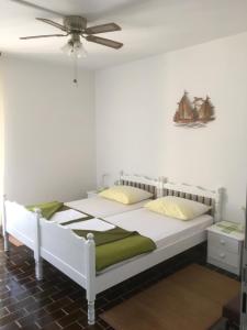 Katil atau katil-katil dalam bilik di Guesthouse Antonija