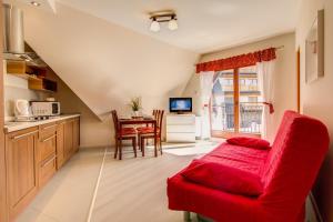 Kuchyňa alebo kuchynka v ubytovaní Apartamenty Smrekowa Zakopane