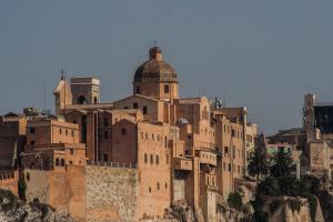 an old building on the side of a mountain at B&B la Bitta in Cagliari