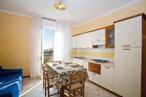 A kitchen or kitchenette at Pia del Faro