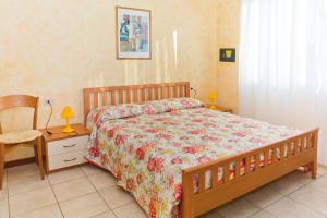 A bed or beds in a room at Pia del Faro