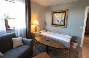 Cama o camas de una habitación en Gardabær Sea View Apartment
