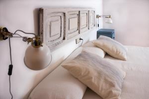 Postel nebo postele na pokoji v ubytování Hostal El Pozo
