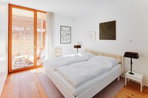 מיטה או מיטות בחדר ב-Ferienhaus Wenefrieda