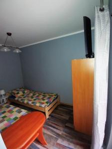 Telewizja i/lub zestaw kina domowego w obiekcie Noclegi pod Klimczokiem