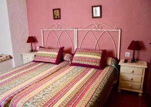 Postel nebo postele na pokoji v ubytování Hostal El Espinel