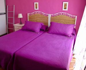 Postel nebo postele na pokoji v ubytování Hostal El Espinel