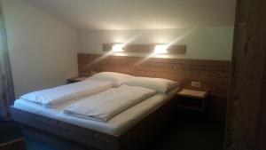 Postel nebo postele na pokoji v ubytování Gabershof
