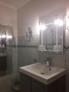 Koupelna v ubytování Hotel Le Beauregard
