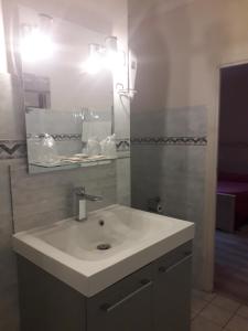 Koupelna v ubytování Hotel Le Beauregard