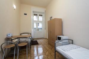 A bed or beds in a room at Riverside City