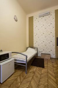 A bed or beds in a room at Riverside City