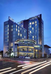 a rendering of a hotel with two tall buildings at ASTON Purwokerto Hotel & Conference Center in Purwokerto