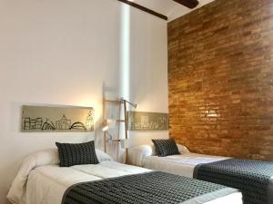 Postel nebo postele na pokoji v ubytování Teixidors de Palomar - PalomarGroup