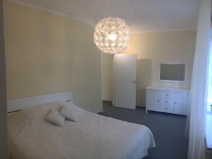 Postel nebo postele na pokoji v ubytování Liivalaia Apartment + 3 fotografie