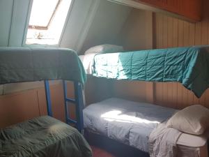 เตียงในห้องที่ Patagonia House