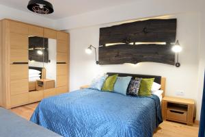 Posteľ alebo postele v izbe v ubytovaní Apartamenty Kora